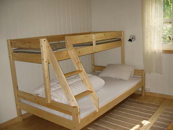 Schlafzimmer mit 2 norwegischen Familienbetten Schlafzimmer mit 2 norwegischen Familienbetten